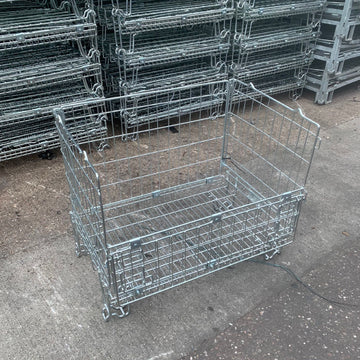 Large used foldable mesh pallet cages.